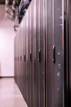 smiling server carrying fresh pizzas